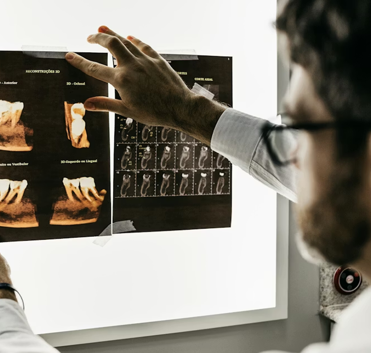 Dentist looking at X-rays